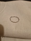 Beautiful thin wobbly designed ladies ring.