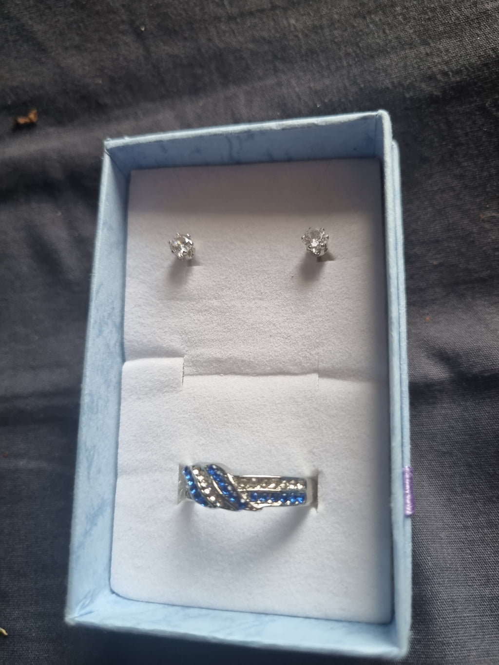 Rhinestone earrings and beautiful silver ladies set beautiful blue and diamond look gems.
