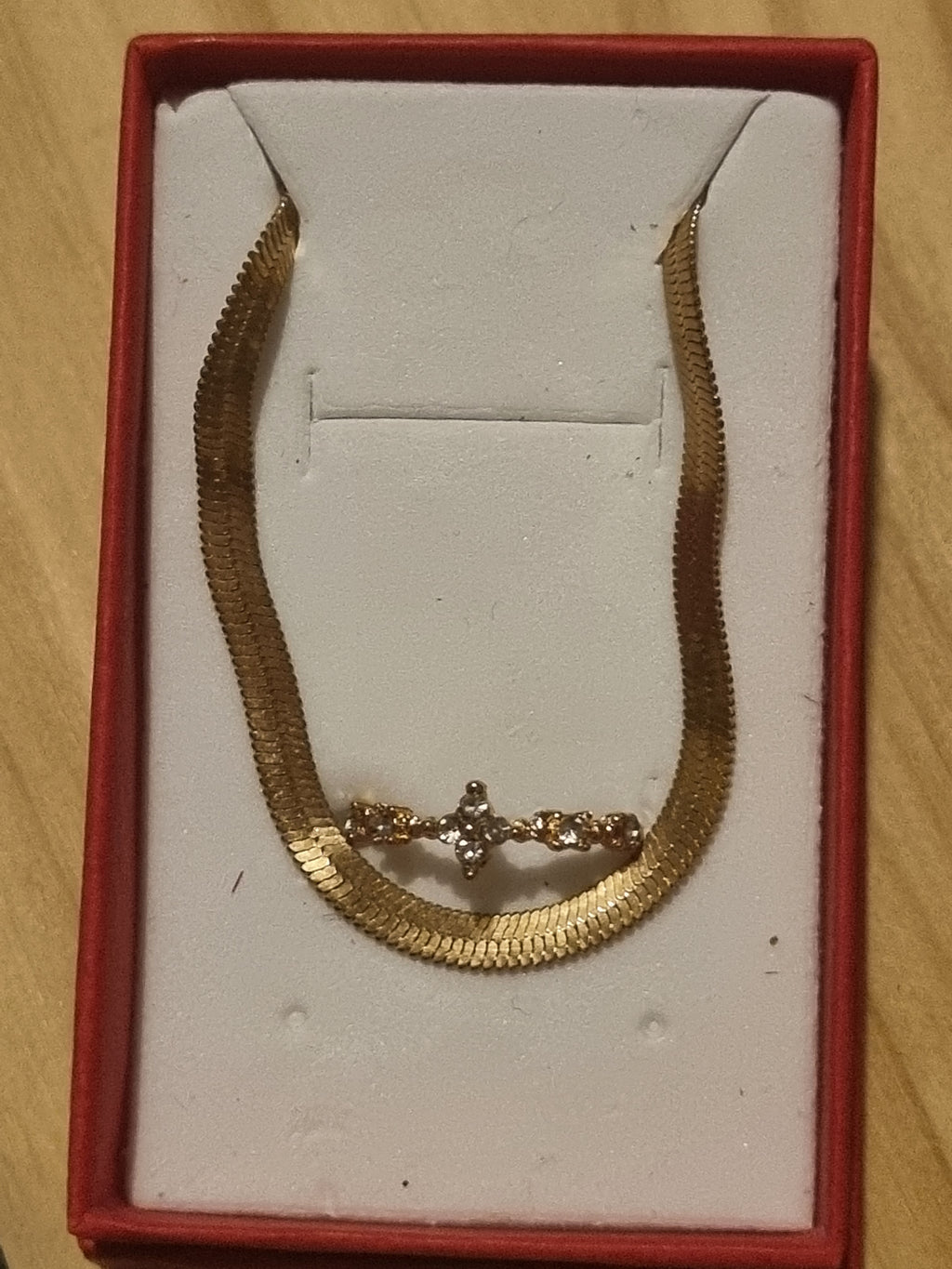 Beautifully designed ladies golden braclet and ring set.