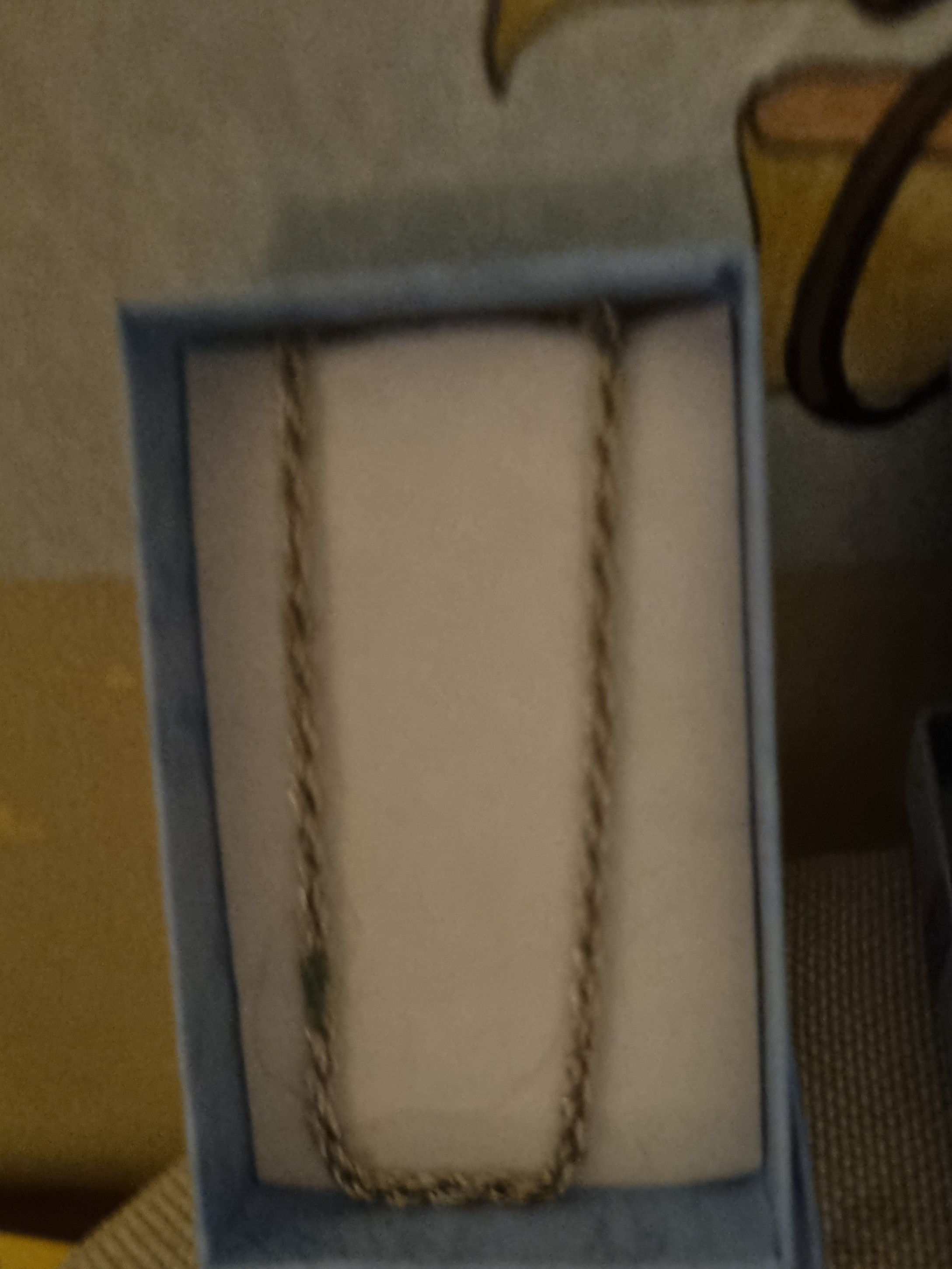 Braclets and a pair of rhinestone earrings
