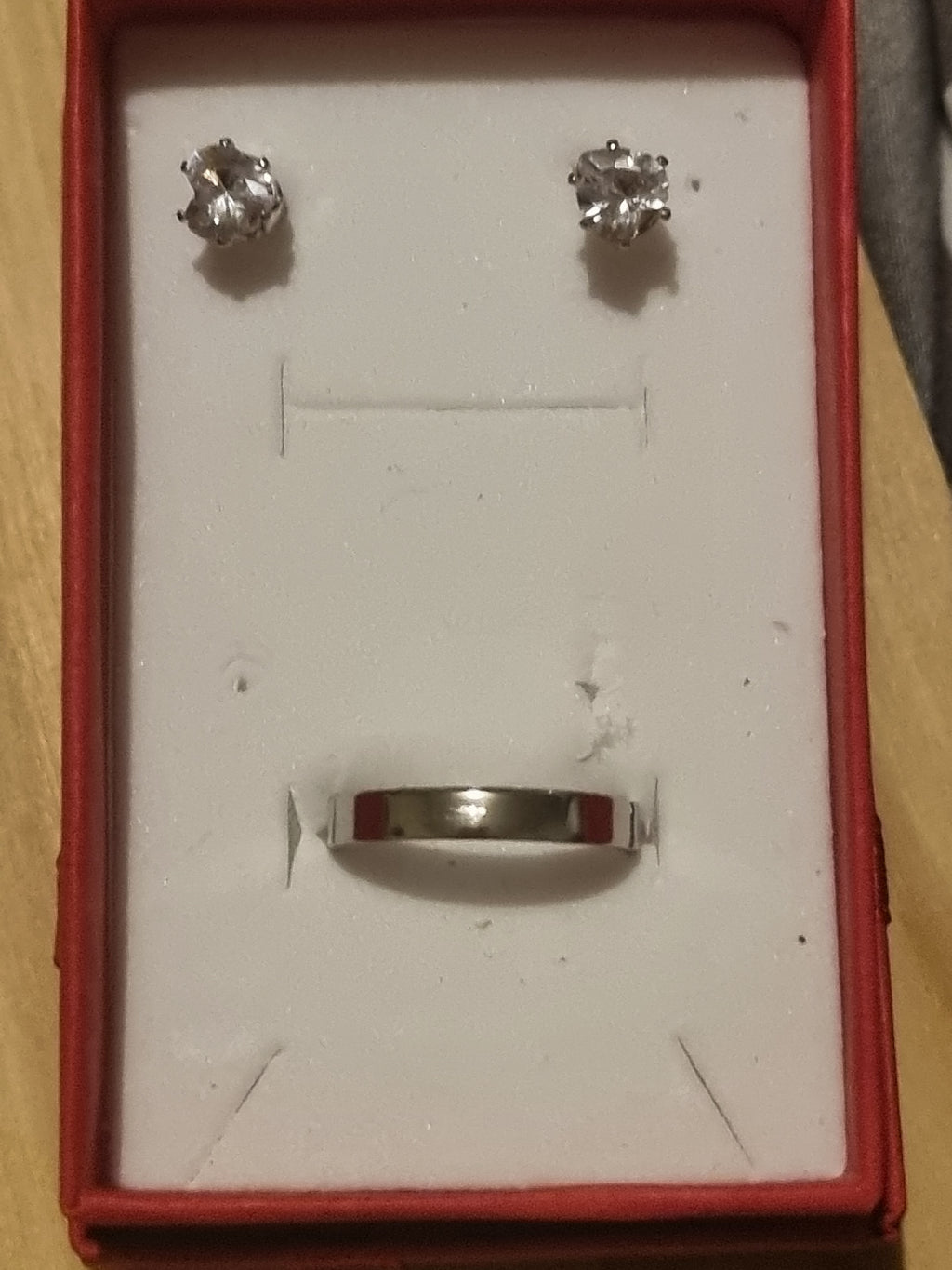 Beautiful Rhinestone earrings and a gorgeous golden ladies band set.